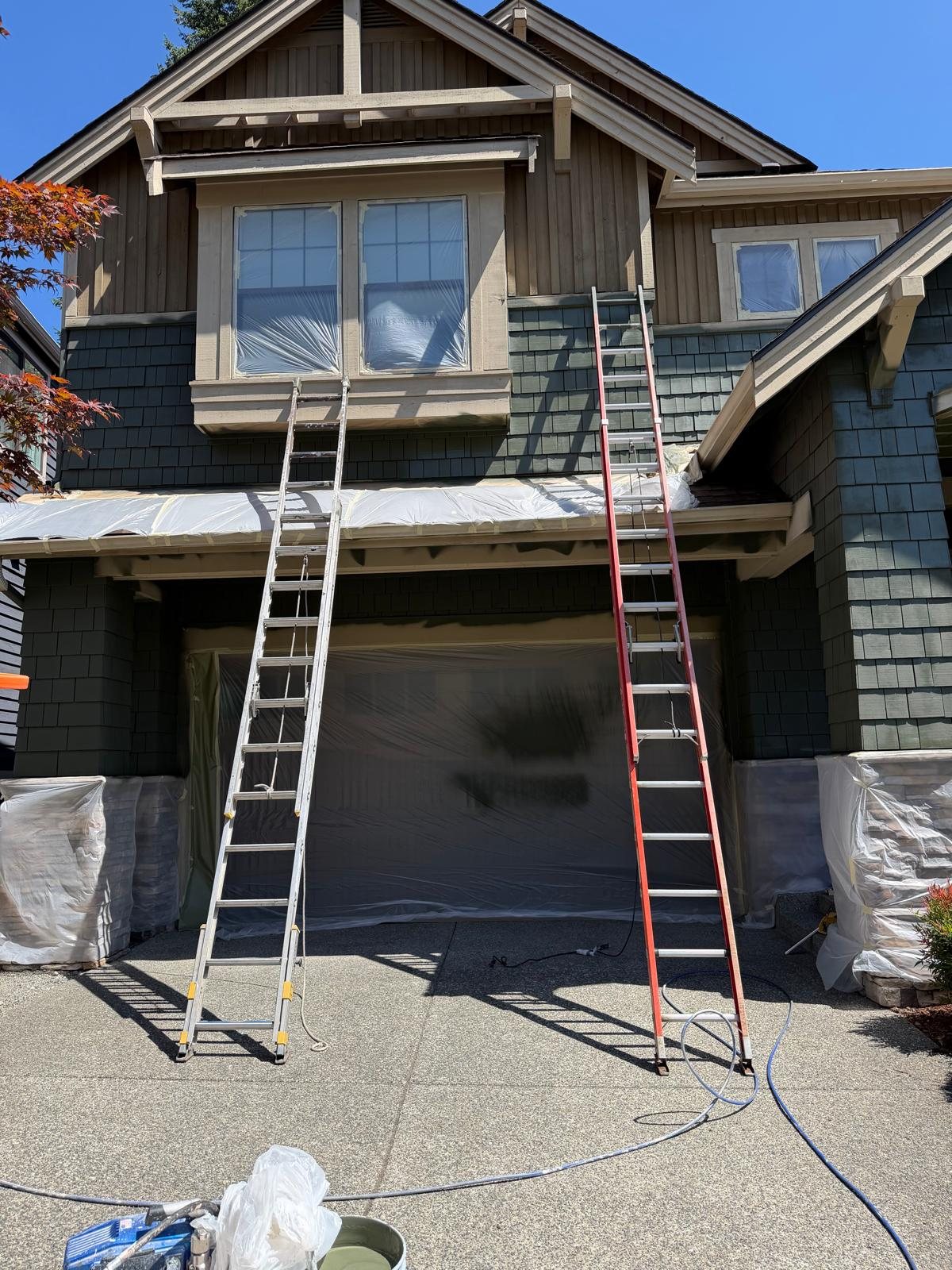 Dark exterior siding renovation on a home